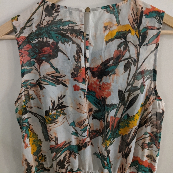 Graphic Sheer Peplum Top - Picture 4 of 4